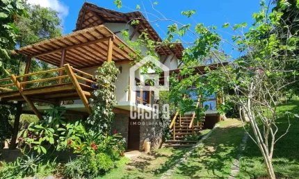 Casa alto padrão na beira da Lagoa Aruá em Praia do Forte Bahia
