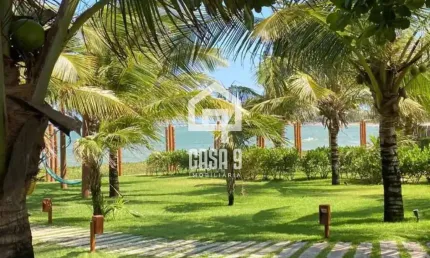 Apartamento térreo 3 suítes pé na areia a venda no condomínio Lua Nova em Itacimirim Bahia