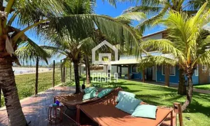 Apartamento térreo pé na areia 3 suítes a venda na praia da espera em itacimirim bahia