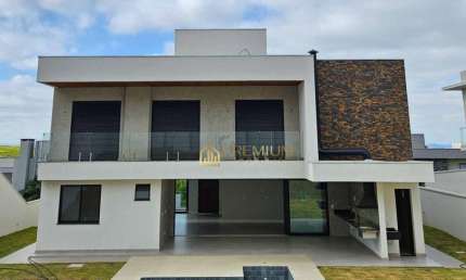 Sobrado com 4 dormitórios à venda, 450 m² por R$ 4.500.000,00 - Condomínio Reserva do Paratehy - São José dos Campos/SP