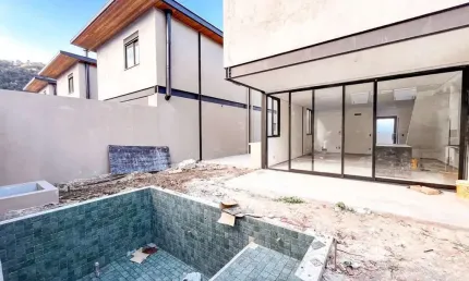 Sobrado com 3 dormitórios à venda, 193 m² por R$ 1.750.000,00 - Barequeçaba - São Sebastião/SP