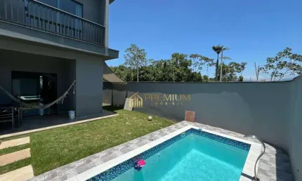 Casa com 3 dormitórios à venda, 100 m² por R$ 660.000,00 - Balneário dos Golfinhos - Caraguatatuba/SP