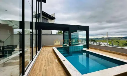 Sobrado com 4 dormitórios à venda, 472 m² por R$ 3.700.000 - Condomínio Residencial Jaguary - São José dos Campos/SP