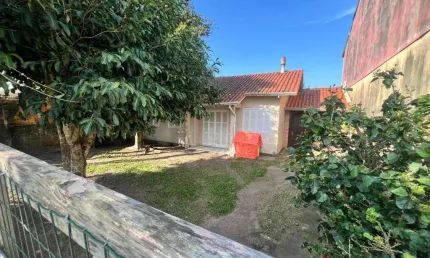 Casa 3 Dormitórios à venda no Bairro Nova Tramandaí com 120 m² de área privativa - 1 vaga de garagem