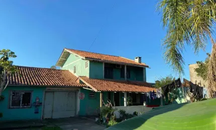 Casa 4 Dormitórios à venda no Bairro Zona Nova com 130 m² de área privativa - 2 vagas de garagem