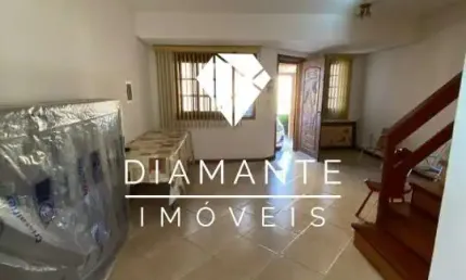 Casa em condomínio fechado com 3 quartos à venda na Avenida Edgar Pires de Castro, Hípica, Porto Alegre por R$ 450.000