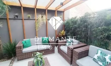 Casa em condomínio fechado com 3 quartos à venda na Rua Corticeira, Hípica, Porto Alegre por R$ 850.000