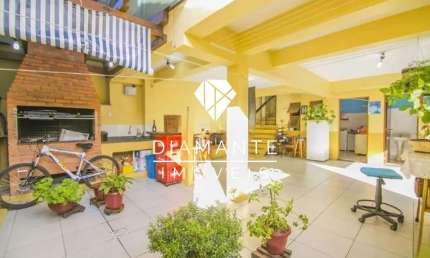 Casa em condomínio fechado com 3 quartos à venda na Rua General Rondon, Tristeza, Porto Alegre por R$ 876.000