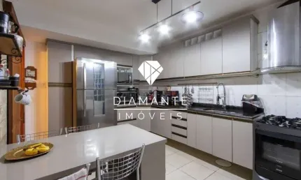 Casa com 3 quartos à venda na Rua Santos Zottis, Hípica, Porto Alegre por R$ 540.000