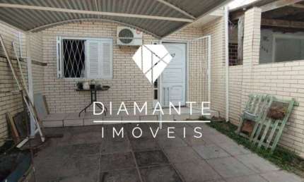 Casa com 3 quartos à venda na Rua Dorival Leivas, Hípica, Porto Alegre por R$ 319.000