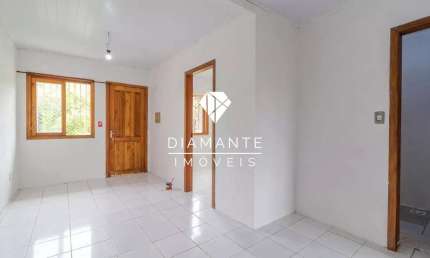 Casa com 2 quartos à venda na Rua do Schneider, Hípica, Porto Alegre por R$ 230.000