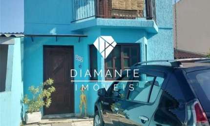 Casa com 3 quartos à venda na Rua Enio Berwanger, Hípica, Porto Alegre por R$ 300.000