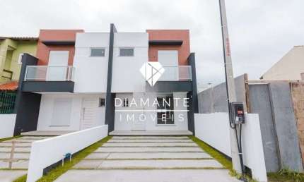 Casa com 3 quartos à venda na Rua Zuzu Angel, Hípica, Porto Alegre por R$ 460.000