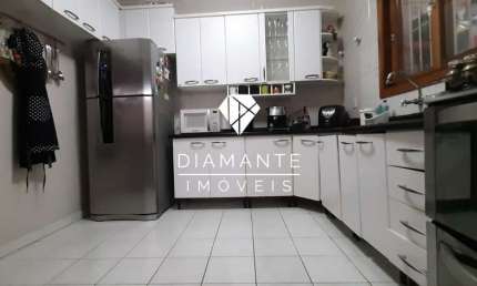 Casa em condomínio fechado com 3 quartos à venda na Avenida Orleaes, Guarujá, Porto Alegre por R$ 449.000