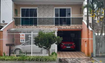 Casa com 4 quartos à venda na Rua Lupionópolis, 1271, Sítio Cercado, Curitiba por R$ 699.900