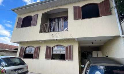 Casa com 4 quartos à venda na Rua Roncador, Cidade Industrial, Curitiba por R$ 699.000
