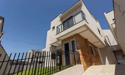 Casa com 3 quartos à venda na Rua Juarez Antônio Bittencourt, 20, Atuba, Curitiba, 103 m2 por R$ 675.000