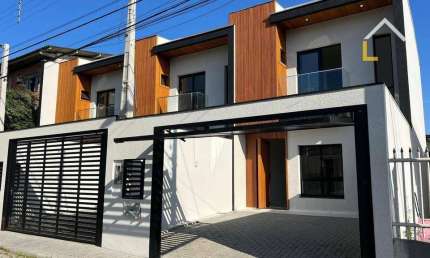 Casa com 3 dormitórios à venda, 103 m² por R$ 730.000,00 - Anita Garibaldi - Joinville/SC