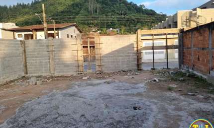Terreno à venda na Rua Um, 22, Martim de Sá, Caraguatatuba