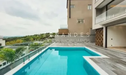 Magnífica casa de alto padrão à venda em condomínio exclusivo em Barueri-SP, com 4 quartos, 4 suítes, 3 salas, 6 banheiros, 4 vagas e 578m².
