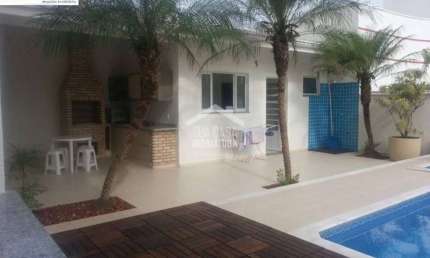 Sobrado para aluguel com 4 suítes, piscina e móveis planejados em Condominio