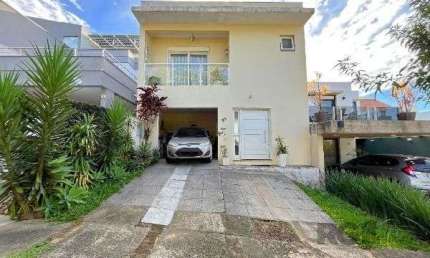 Casa Condominio em Porto Alegre, no bairro Vila Nova, com 3 dormitório(s), e 3 b