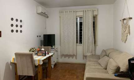 Apartamento de 2 dormitórios, living, cozinha, área de serviço e banheiro social