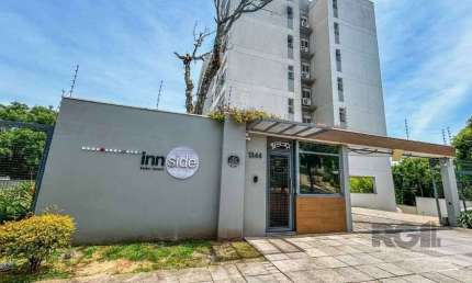 Apartamento de 2 dormitórios, living, cozinha planejada, área de serviço, banhei