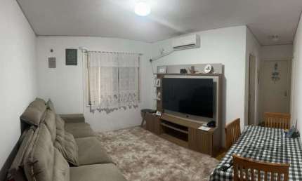 Apartamento de 2 dormitórios, living, cozinha, área de serviço e banheiro social