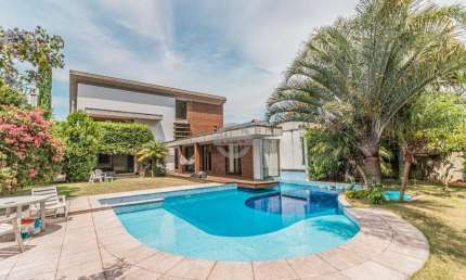 Casa em condomínio fechado com 4 quartos à venda na Avenida Juca Batista, 8000, Belém Novo, Porto Alegre por R$ 2.900.000