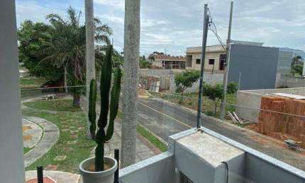 Casa com 3 dormitórios à venda, 160 m² por R$ 1.130.000 - Manguinhos - Serra/ES