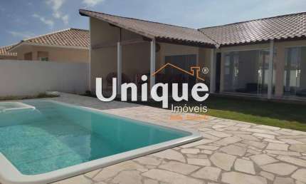 Casa com piscina e 4 quartos na Praia Linda, à venda por R$ 600.000,00.