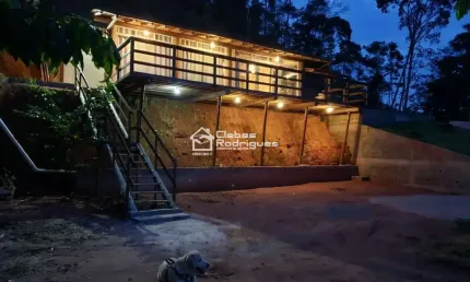 Terreno em Buenos Aires Guarapari , com casa nova com 172 M2 com bastante área verde.