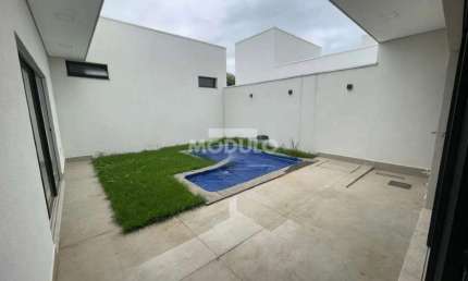 Casa em condomínio fechado com 3 quartos para alugar na Avenida Manuel Lucio, --, Grand Ville, Uberlândia