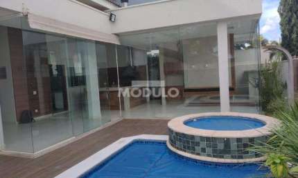 Casa residencial em condomínio para locação, bairro Jardim das Palmeiras