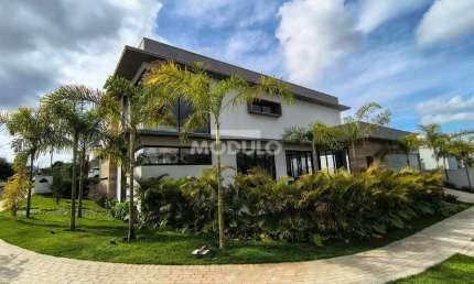 Casa residencial de condomínio para locação, bairro Jardim Sul com 4 quatos