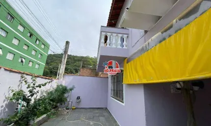 Sobrado com 3 dormitórios à venda, 120 m² por R$ 400.000 - Vila São Paulo - Mongaguá/SP