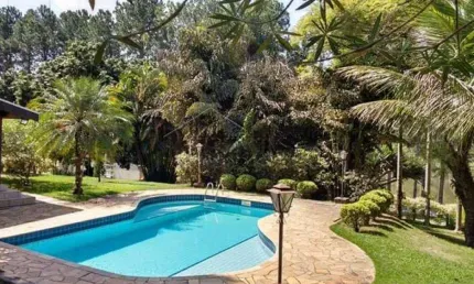 Casa com 3 dormitórios, 380 m² - Condomínio Chácaras Cataguá - Taubaté/SP.