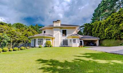 Casa com 6 suítes, 700 m² - Condomínio Vila Simonsen - Campos do Jordão/SP.