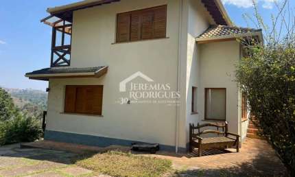 Casa com 3 suítes, 332 m² - Condomínio Florestal Clube - Campos do Jordão/SP.