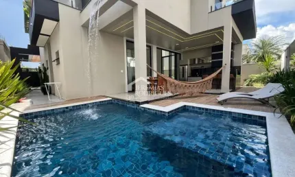 Casa assobradada à venda com 4 suítes no Condomínio Residencial Terras de San Marco em Taubaté/SP.