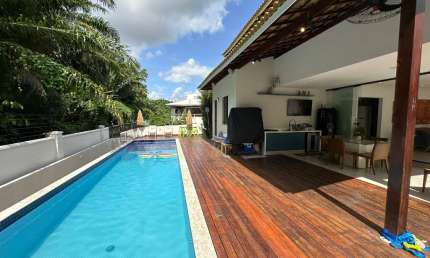 linda casa em alphaville litoral norte 1 com 4 suítes mobiliada reformado