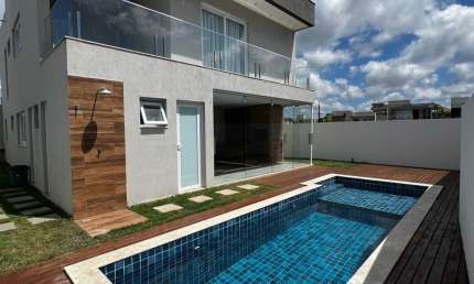 casa em alphaville litoral norte 2 com 4 suítes piscina e espaço gourmet