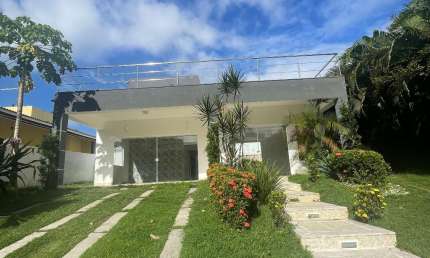 Casa a venda em Alphaville Litoral Norte 1 com 4 suites piscina e area gourmet