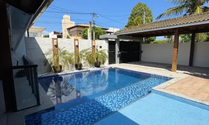 Casa a venda em condomínio fechado vila de joanes com 4 suites