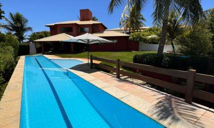 Casa a venda no cond praia dos lagos com 4 suites mobiliada e pé na areia