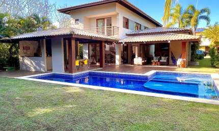 Casa a venda em praia do forte com 4 suítes no condomínio das acácias piscinas naturais
