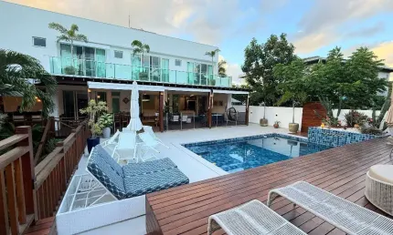 Casa a venda em busca vida com 4 suites piscina área gourmet em condominio fechadp