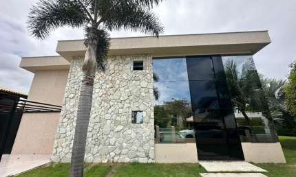 Casa a venda no condominio busca vida com 4 suites piscina e área gourmet