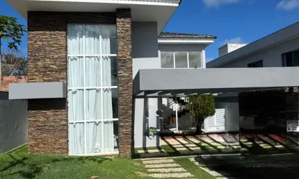 Casa a venda em alphaville litoral norte 3 com 4 suites piscina e área gourmet